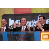 Microsoft CFO Christopher Liddell (L) and CEO Steve Ballmer (C) ring the NASDAQ opening bell with NASDAQ President and CEO Robert Greifeld (R)